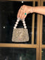 DULL GOLD BAG WITH PEARL HANDLE